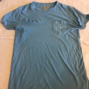 A blue long Vans tee